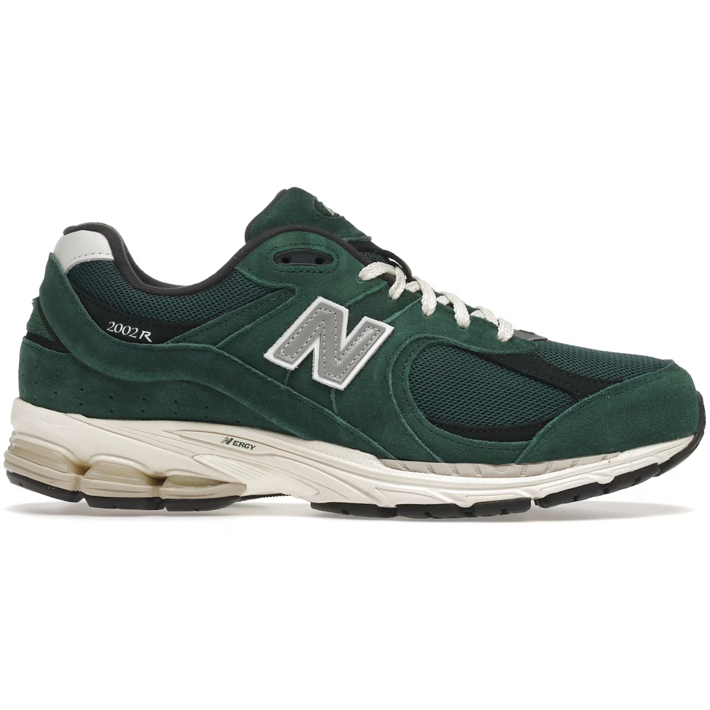 Green running shoe with white sole on a white background