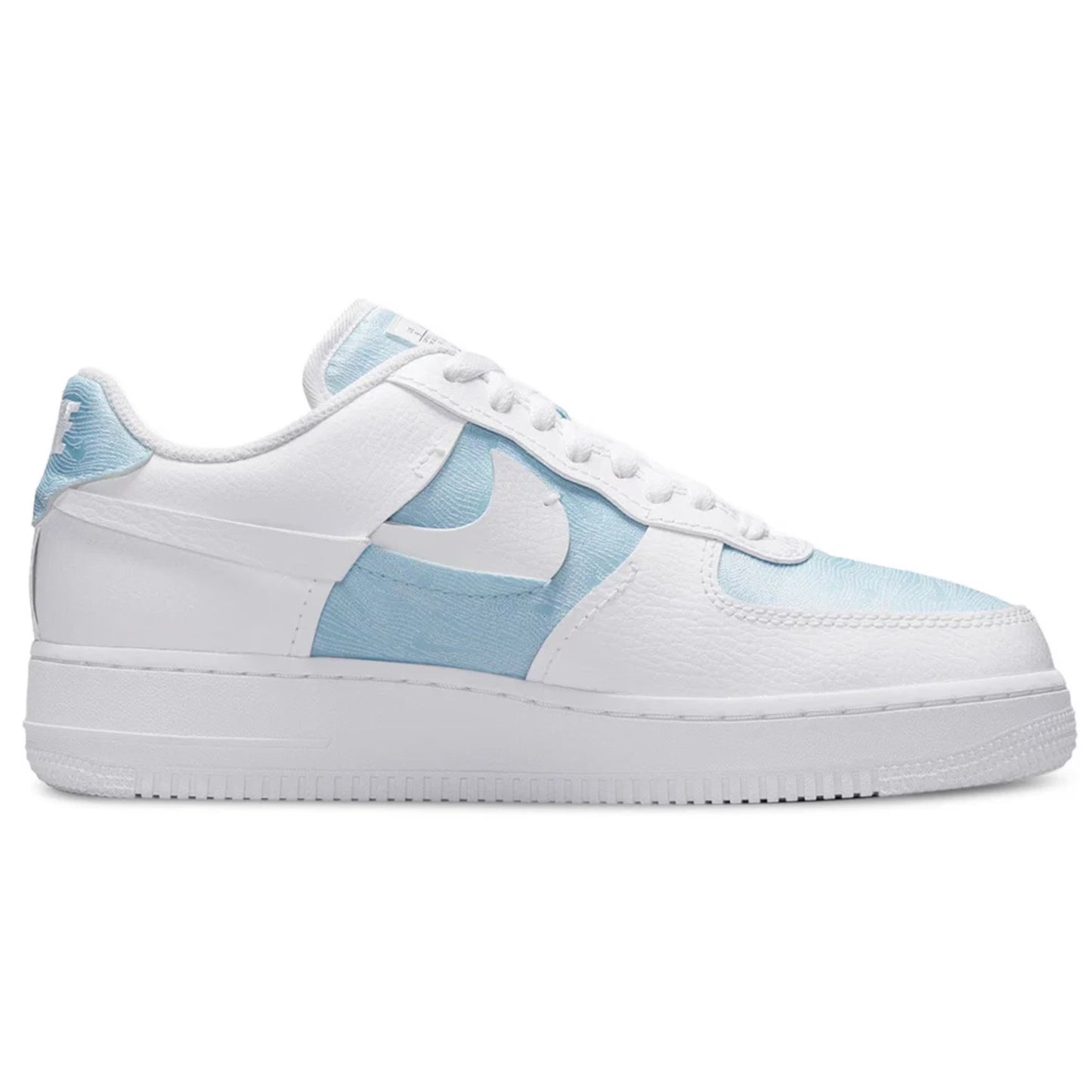 White sneaker with light blue accents on a white background