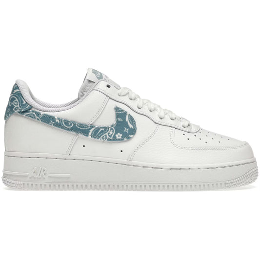White sneaker with blue patterned Nike logo on a white background