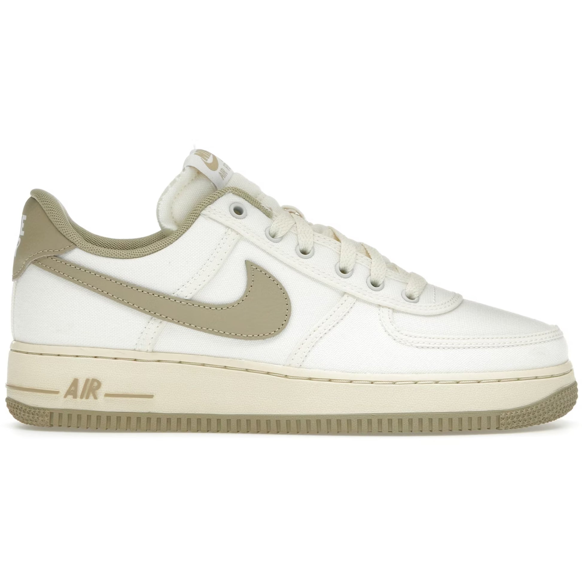 White sneaker with beige accents on a white background