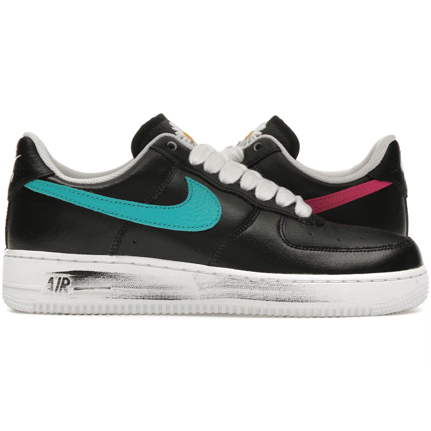 Black sneakers with colorful swooshes on a white background
