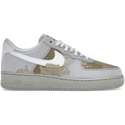 Gray sneaker with camouflage pattern and white Nike logo on a white background