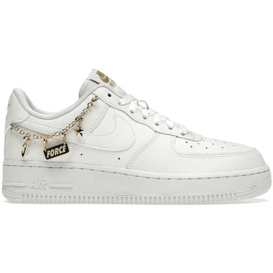 White sneaker with gold chain and 'FORCE' tag on a white background