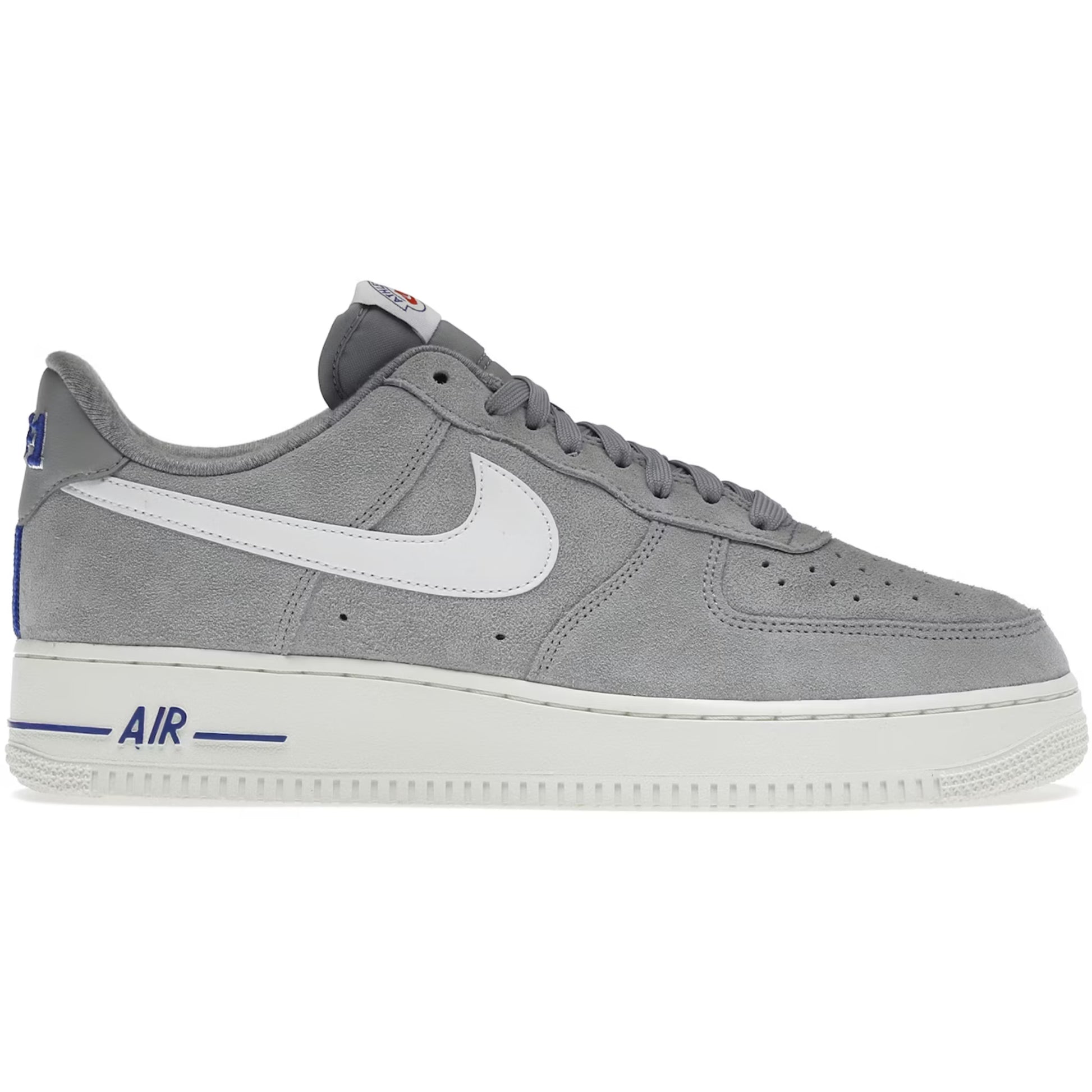 Gray sneaker with white swoosh logo on a white background