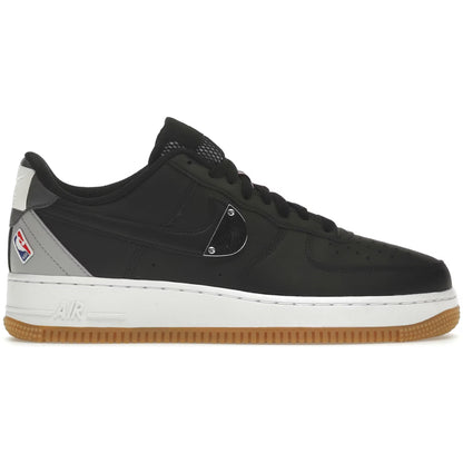 Black sneaker with a white sole on a white background