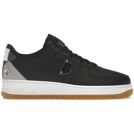 Black sneaker with a white sole on a white background