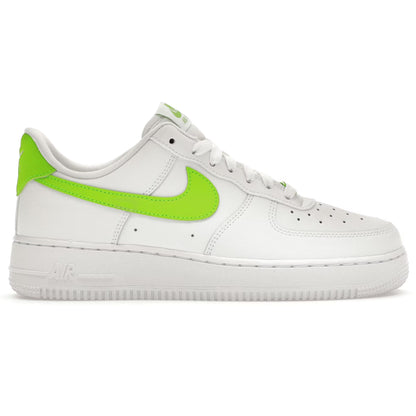 White sneaker with a bright green Nike logo on a white background