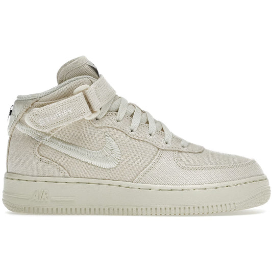Beige sneaker with brand logo on a white background