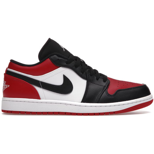Red, black, and white sneaker with Nike logo on a white background