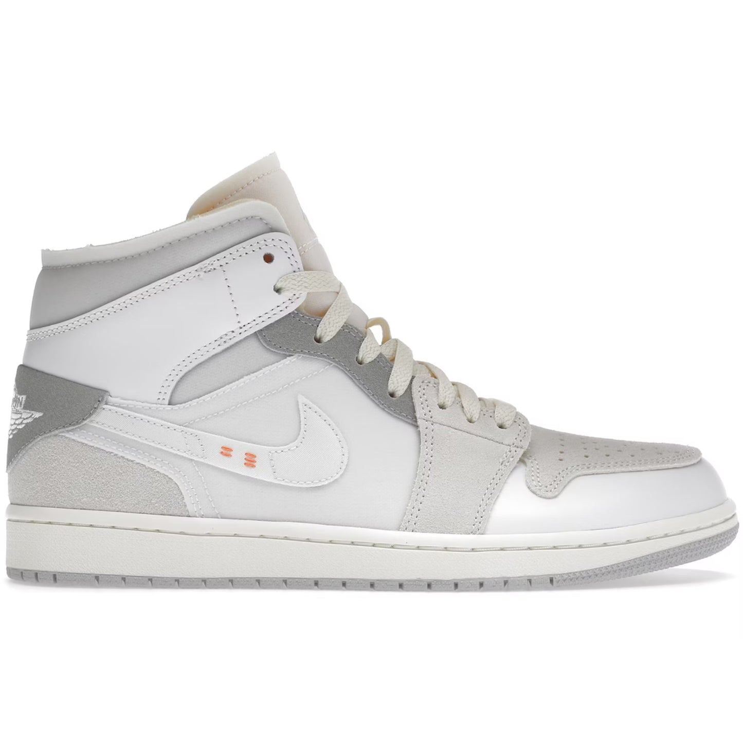 Gray and white sneaker with Nike logo on a white background
