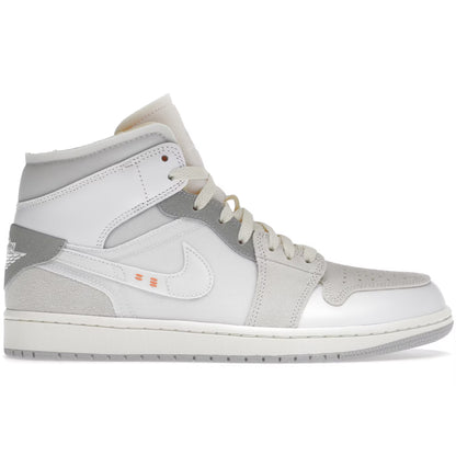Gray and white sneaker with Nike logo on a white background