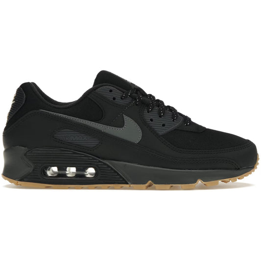 Black sneaker with visible Nike logo on a white background