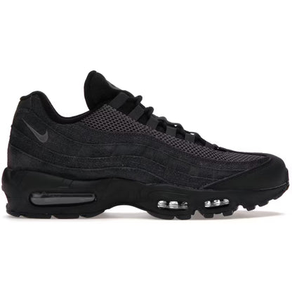 Black sneaker with visible Nike logo on a white background