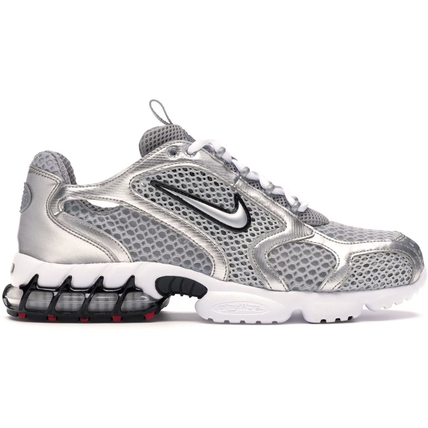 Silver and white sneaker with Nike logo on a white background