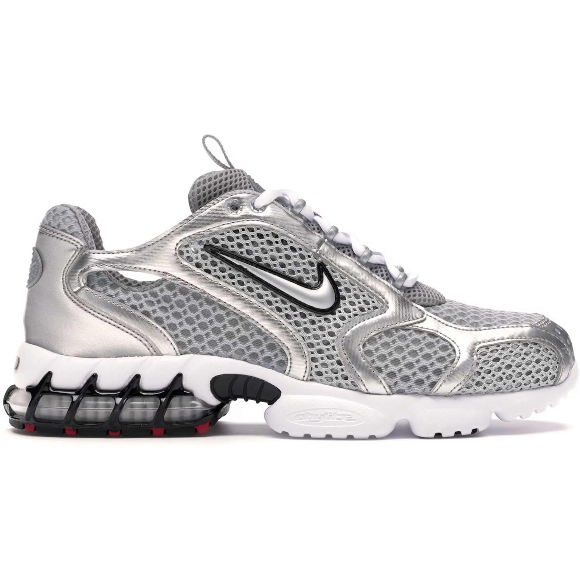 Silver and white sneaker with Nike logo on a white background
