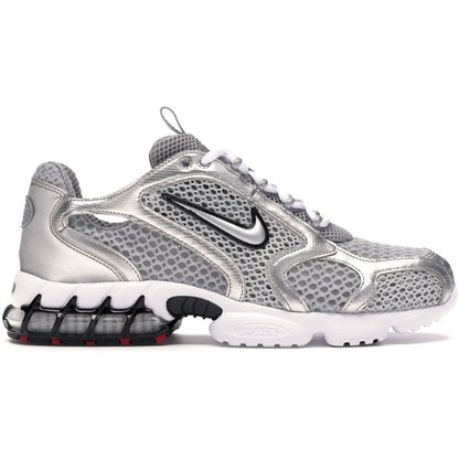 Silver and white sneaker with Nike logo on a white background