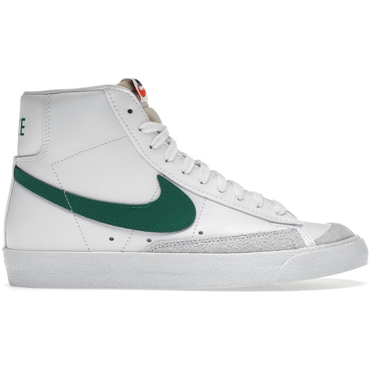 White sneaker with green swoosh logo on a white background