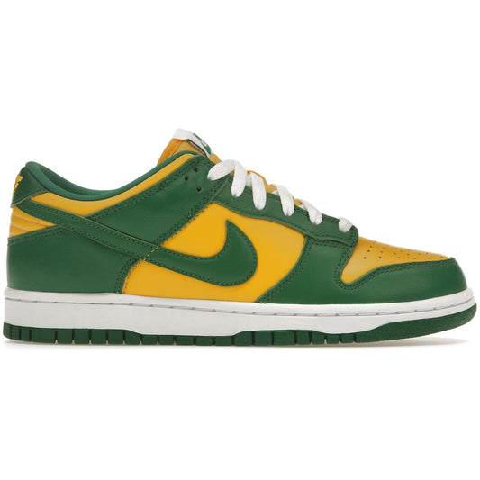 Green and yellow sneaker with white accents on a white background