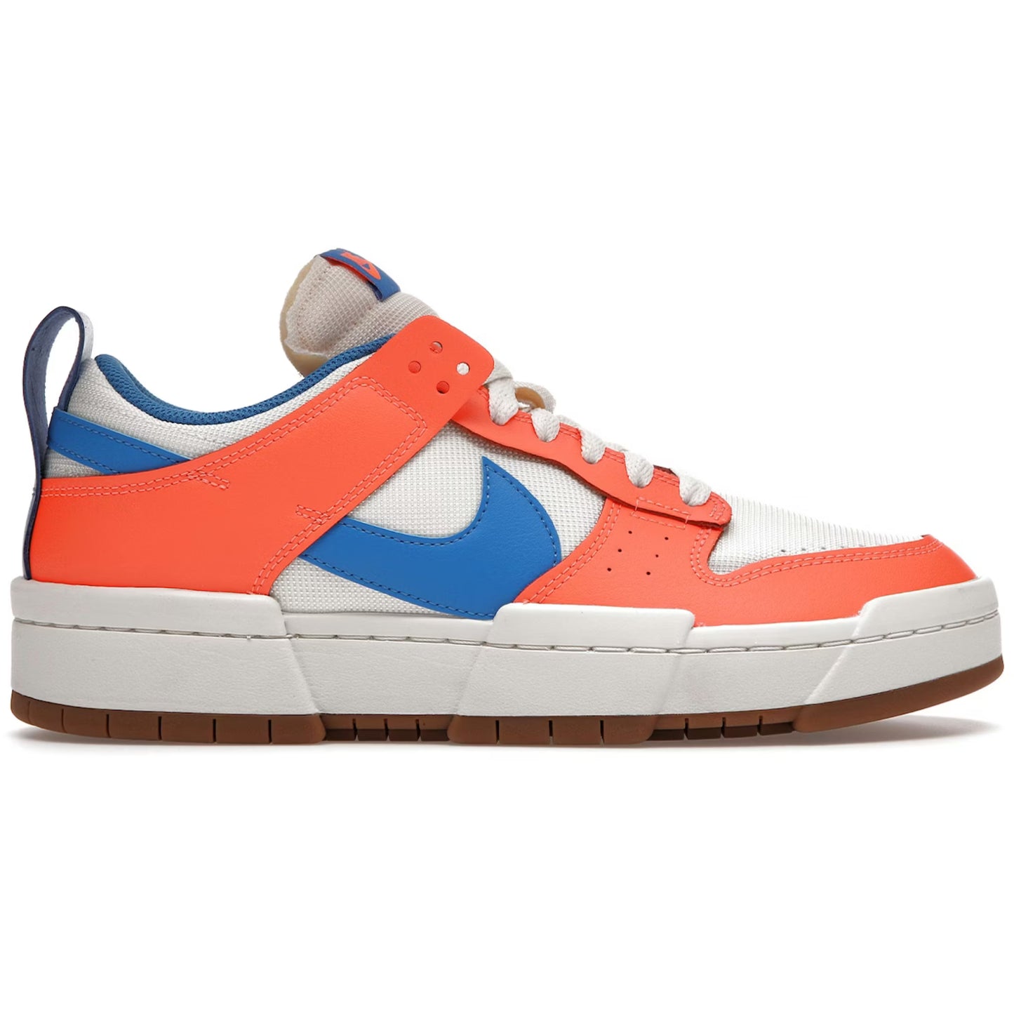 Sneaker with orange, blue, and white design on a white background