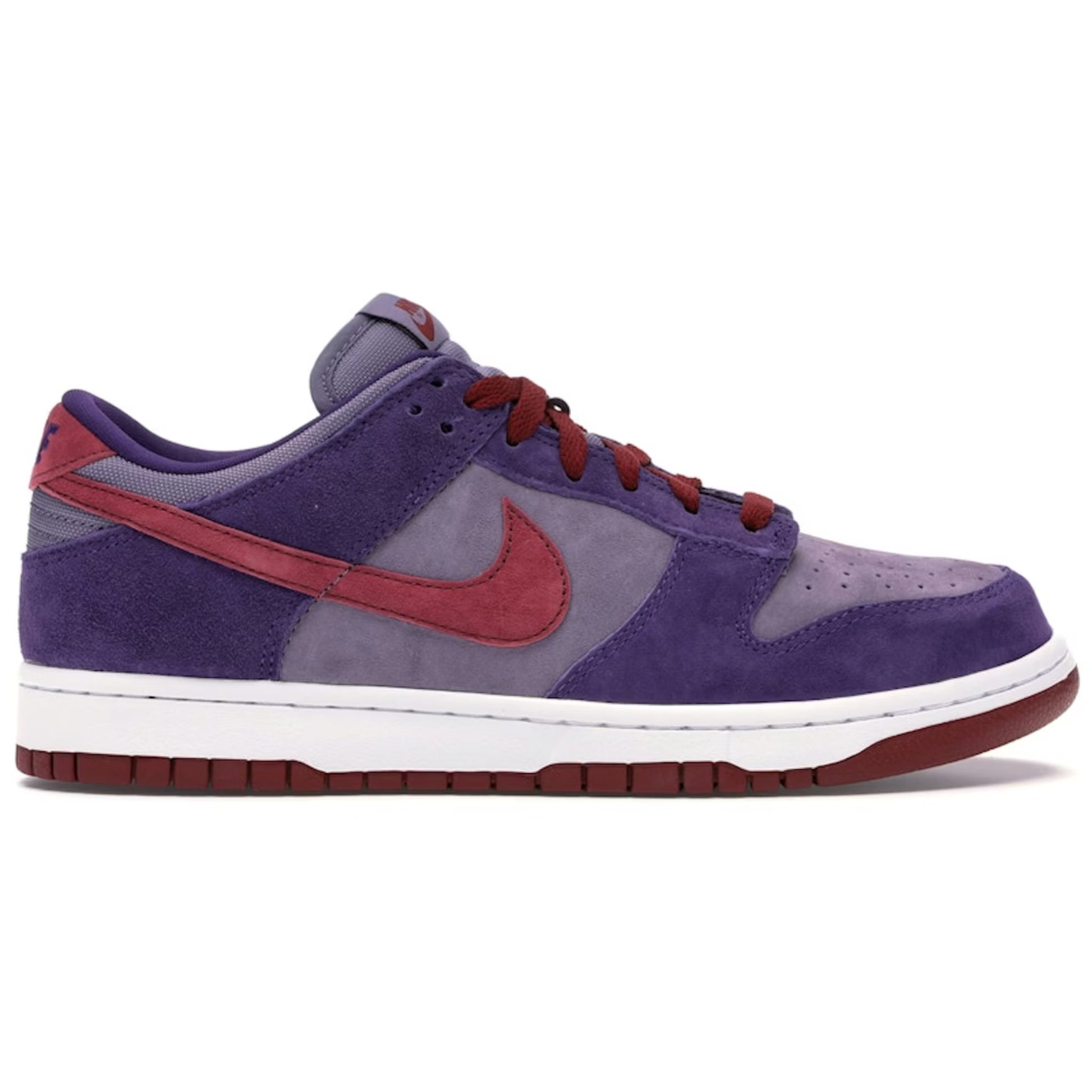 Purple and red sneaker with a white sole on a white background