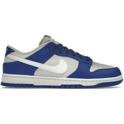 Blue and gray sneaker with a white logo on a white background