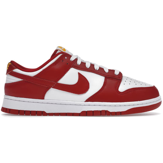 Red and white sneaker with Nike logo on a white background
