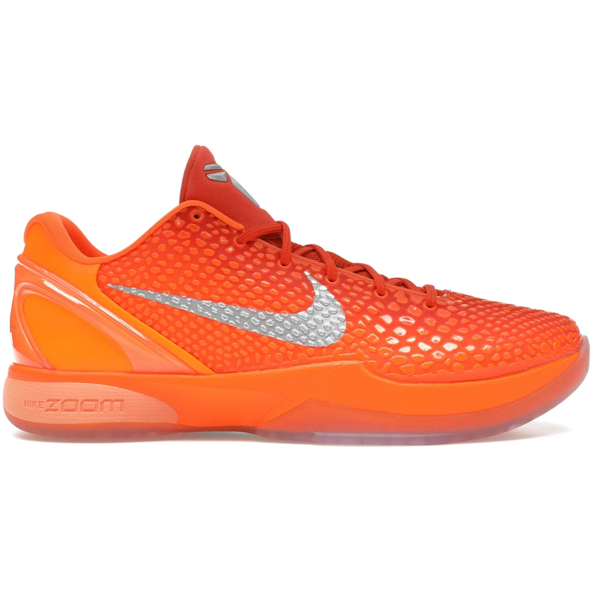 Orange basketball shoe with a silver Nike logo on a white background