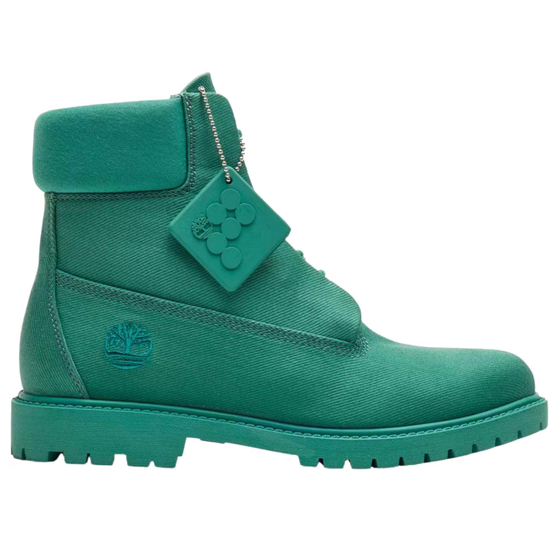Green boot with a brand tag on a white background
