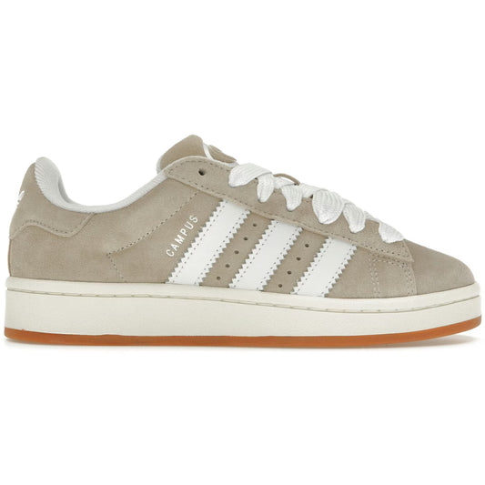Gray Adidas sneaker with white stripes on a white background