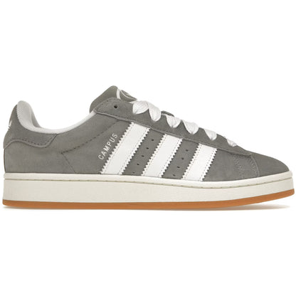 Gray Adidas sneaker with white stripes on a white background