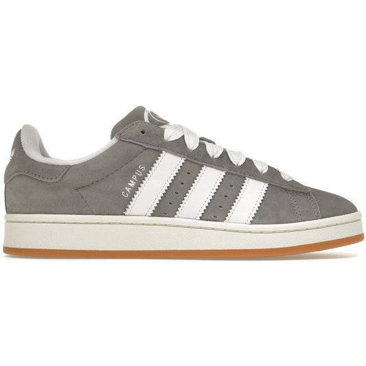 Gray Adidas sneaker with white stripes on a white background