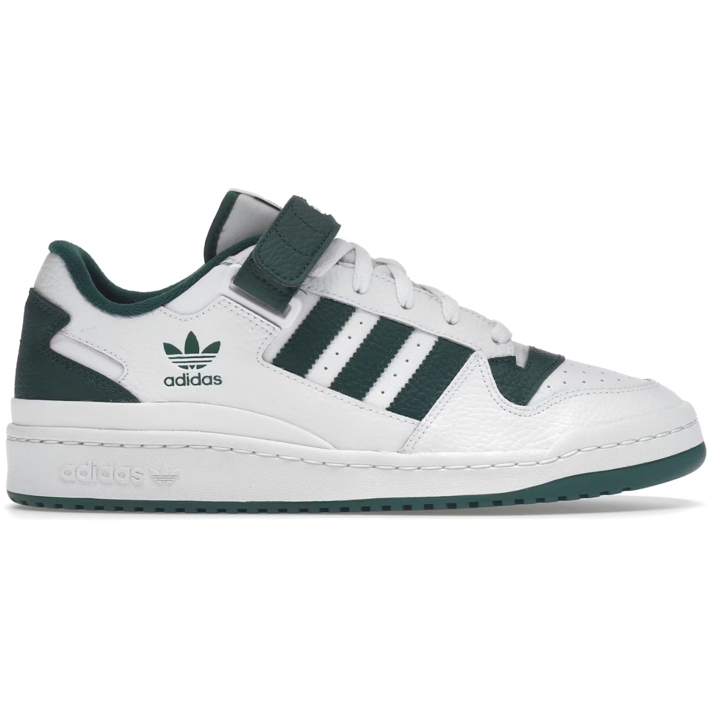 White Adidas sneaker with green accents on a white background