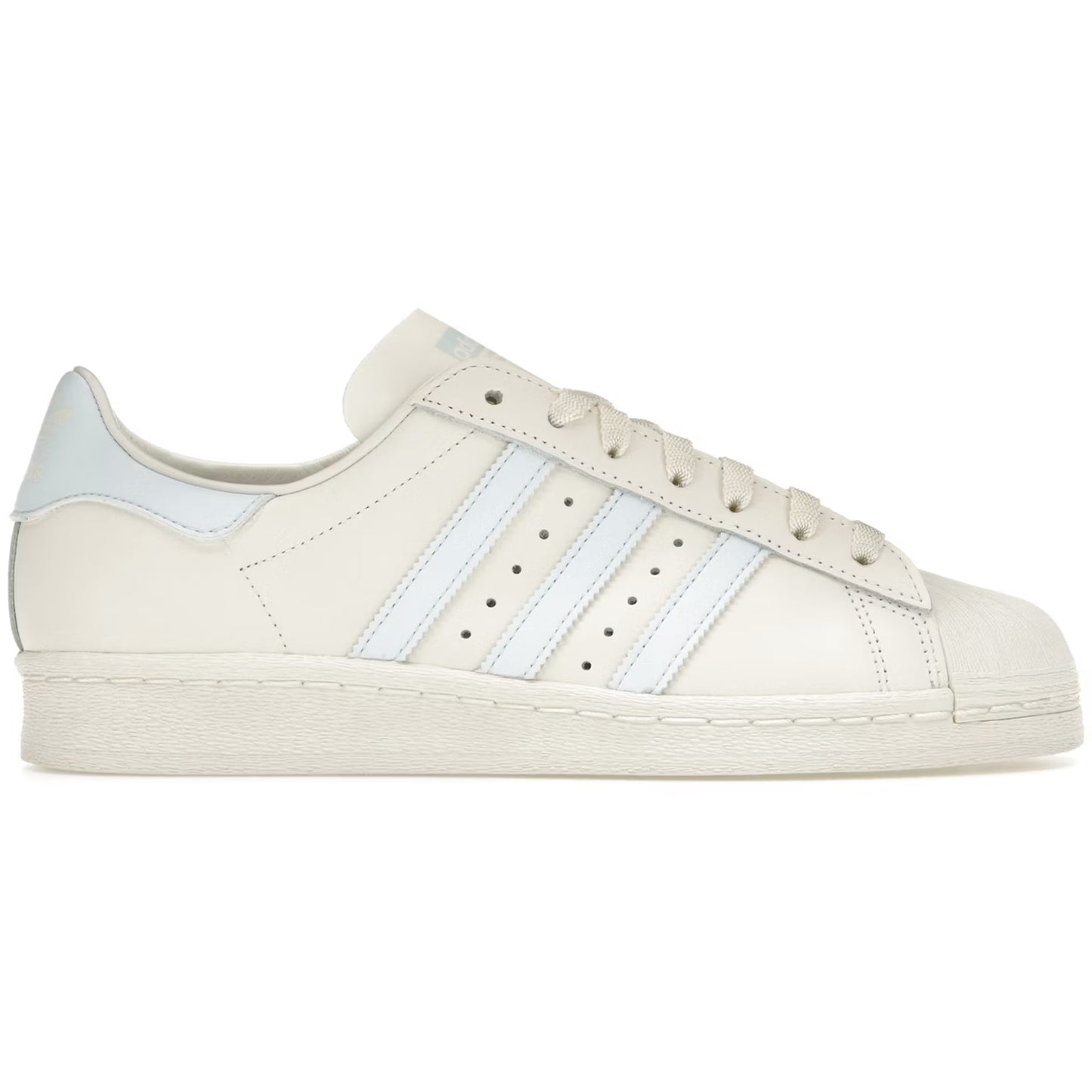 Beige sneaker with white stripes on a white background
