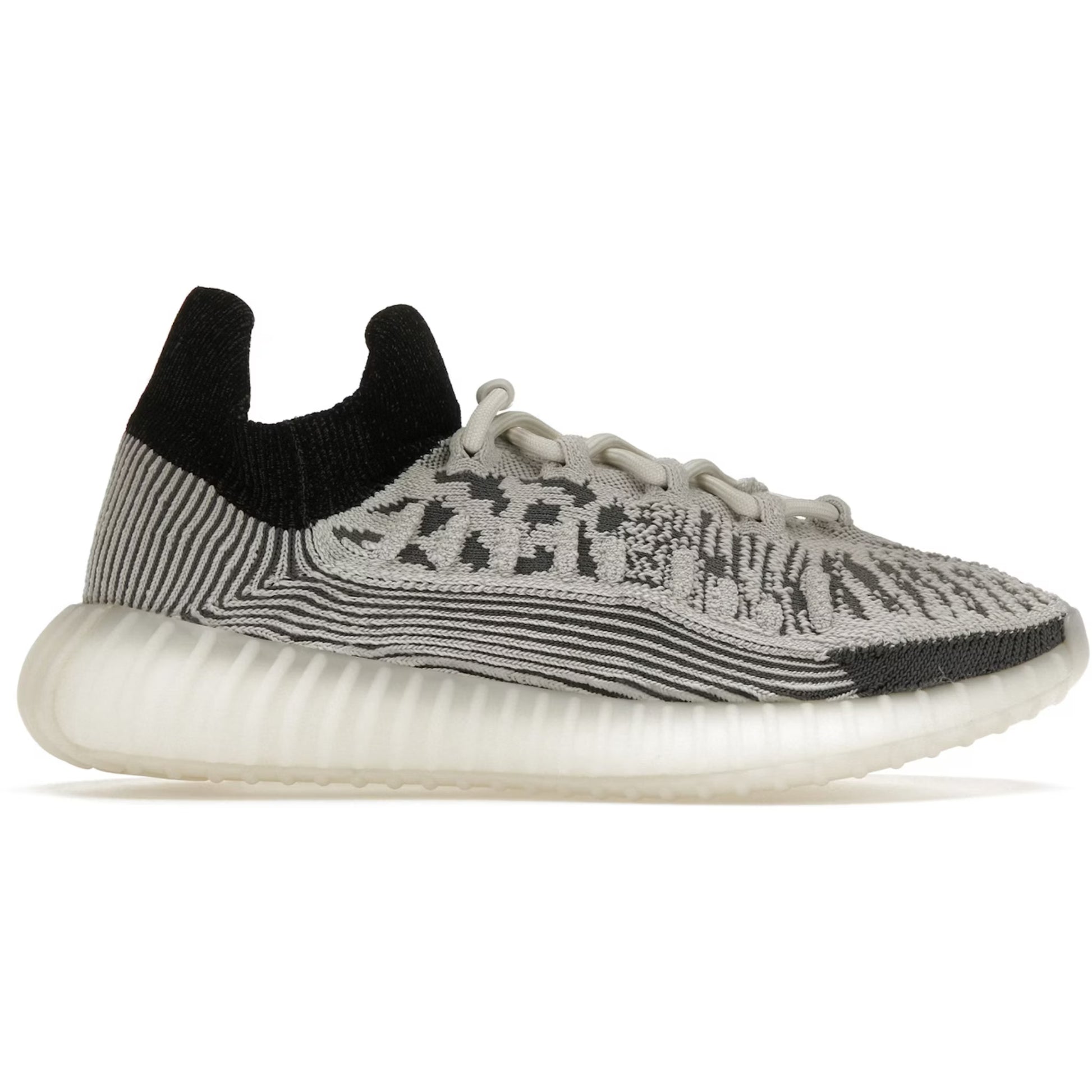 Gray and black sneaker with a white sole on a white background
